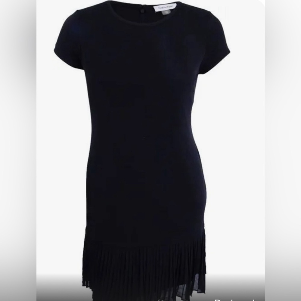 Calvin Klein size 4 black dress with pleated bottom. Worn only a few times